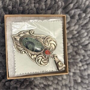 Silver Brooch with Green and Red Stones